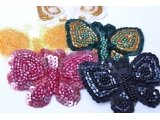 Motif papillon perle et paillettes